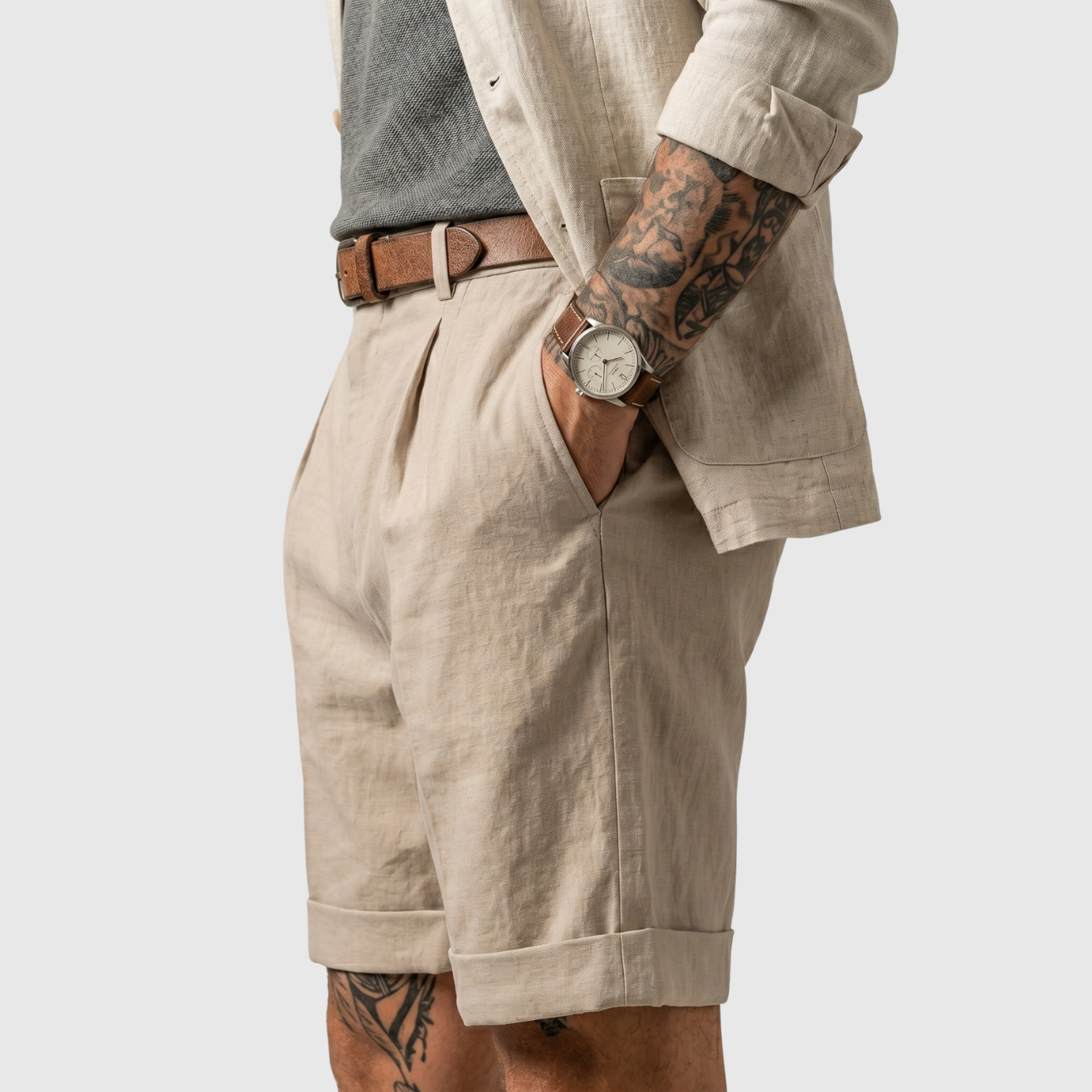 Short homme plissé coupe droite ourlets retroussés taille classique