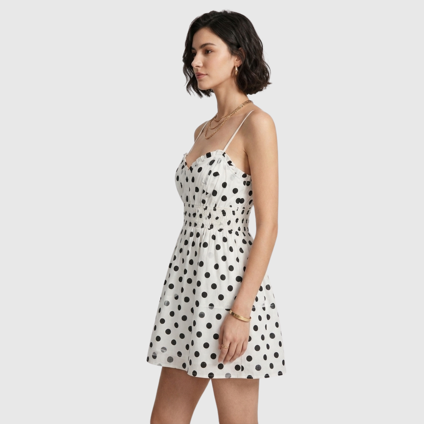 Robe courte femme à pois fines bretelles coupe évasée