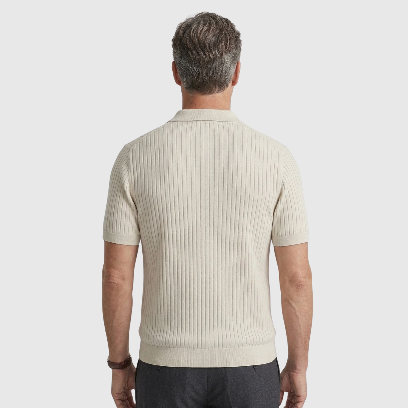 Polo homme maille côtelée manches courtes col boutonné coupe ajustée coton