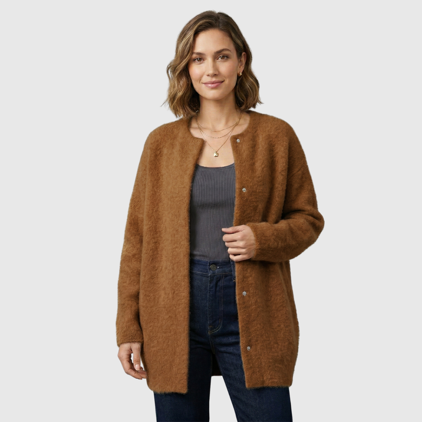 Gilet femme laine coupe ample avec poches et empiècements suédés