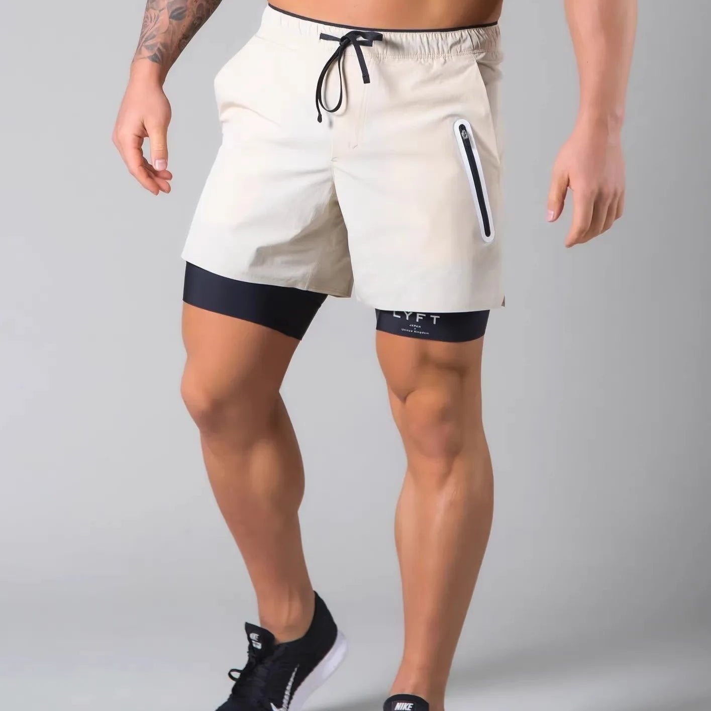 Short de sport homme 2-en-1 avec compression intégrée