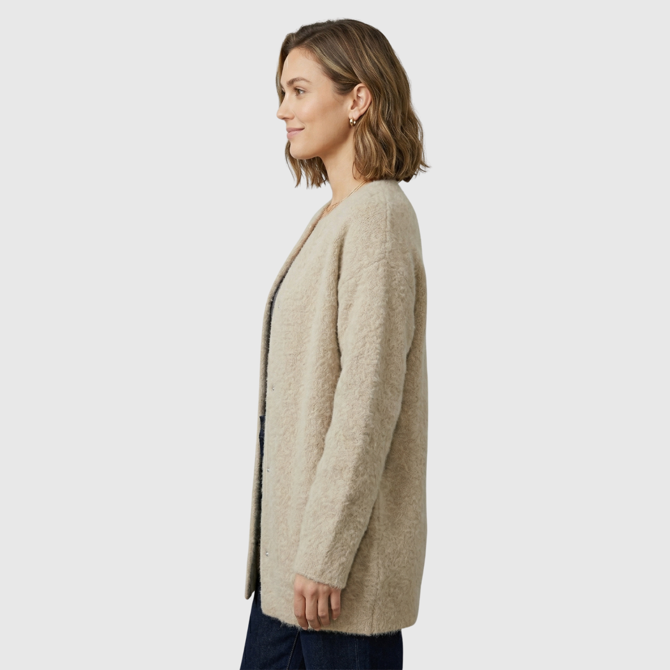 Gilet femme laine coupe ample avec poches et empiècements suédés
