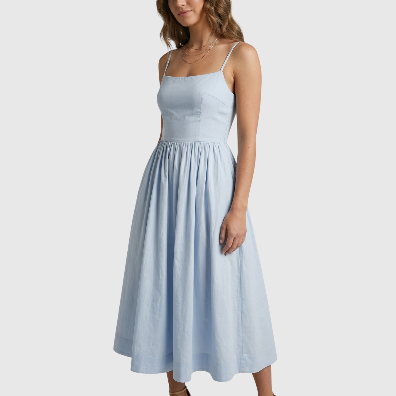 Robe midi femme bretelles fines coupe cintrée jupe évasée taille marquée