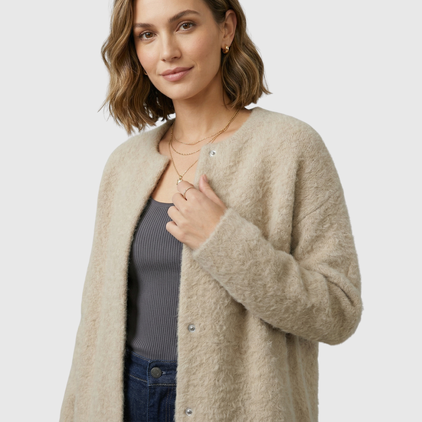 Gilet femme laine coupe ample avec poches et empiècements suédés