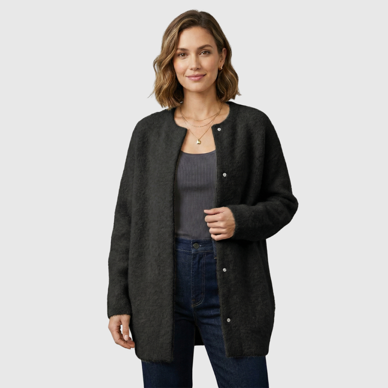 Gilet femme laine coupe ample avec poches et empiècements suédés