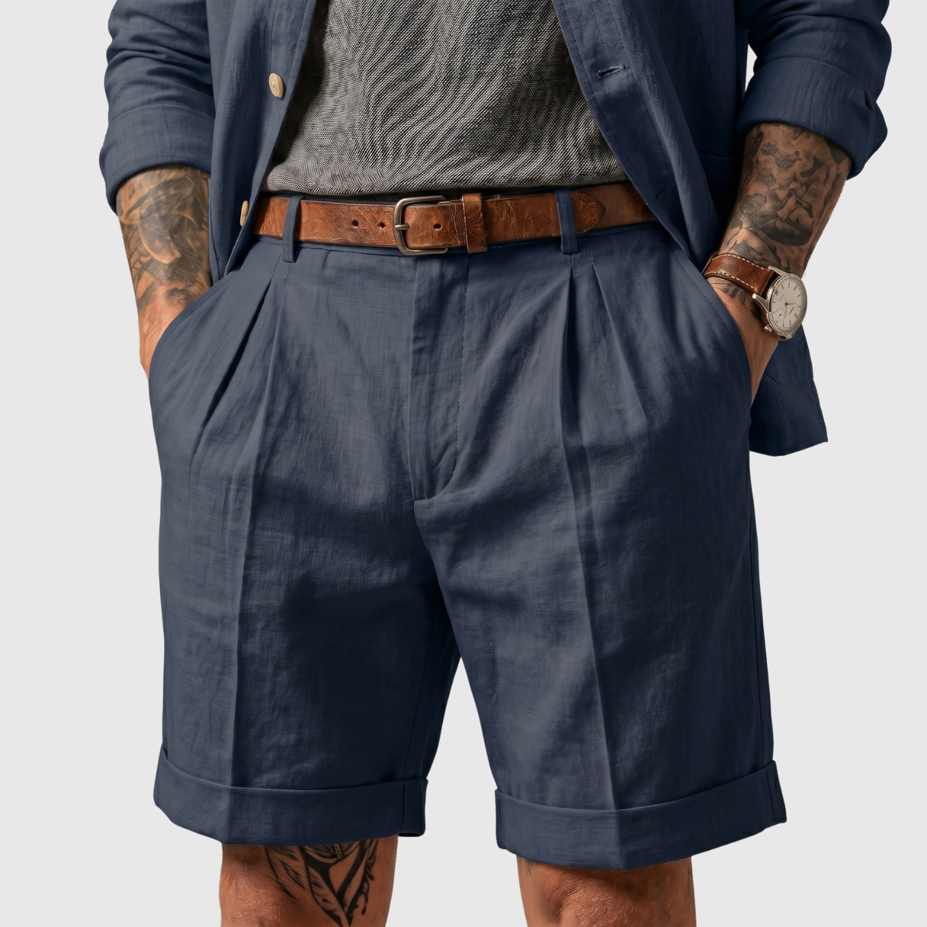 Short homme plissé coupe droite ourlets retroussés taille classique