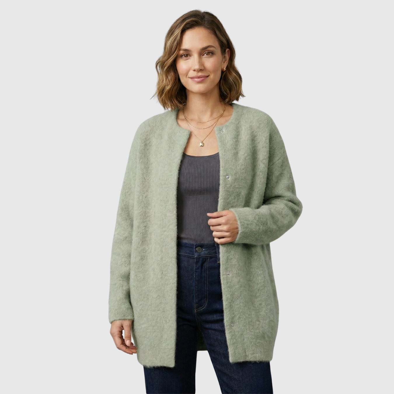 Gilet femme laine coupe ample avec poches et empiècements suédés